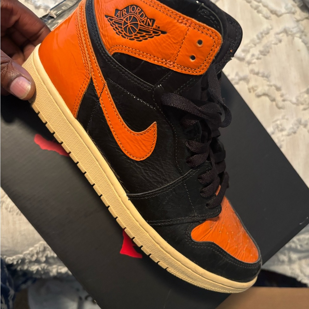 Jordan High-Top Sneakers in Black and Orange